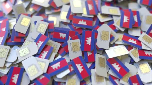 Många SIM-kort med flagga av Kambodja. Kambodjanska mobil telekommunikation relaterade 3D-animering — Stockvideo