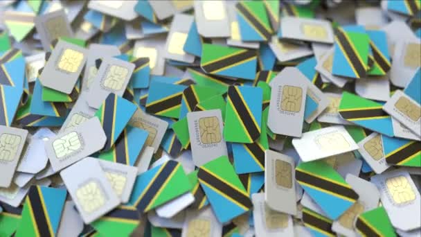 De nombreuses cartes SIM avec drapeau de Tanzanie. Animation 3D liée aux télécommunications mobiles tanzaniennes — Video