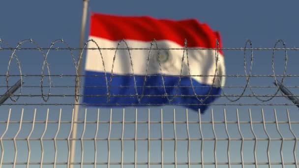 Nationale vlag van Paraguay achter prikkeldraad hek. Conceptuele loop bare 3D-animatie — Stockvideo