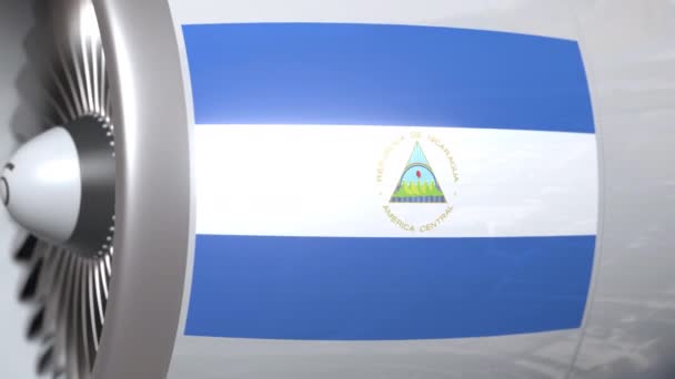 Bandera ondeante de Nicaragua en el motor tourbine del avión. Aviación animación 3D relacionada — Vídeo de stock