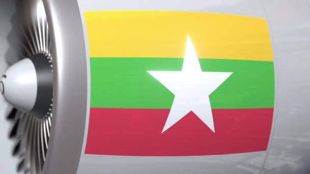 Размахивание флагом Мьянмы на турбинном двигателе самолета. Авиационная 3D анимация — стоковое видео