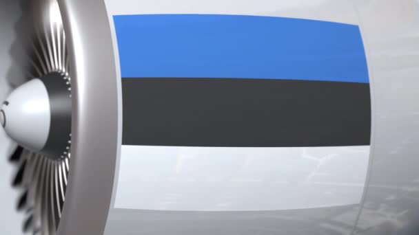 Ondeando la bandera de Estonia en el motor de tourbine del avión. Aviación animación 3D relacionada — Vídeo de stock