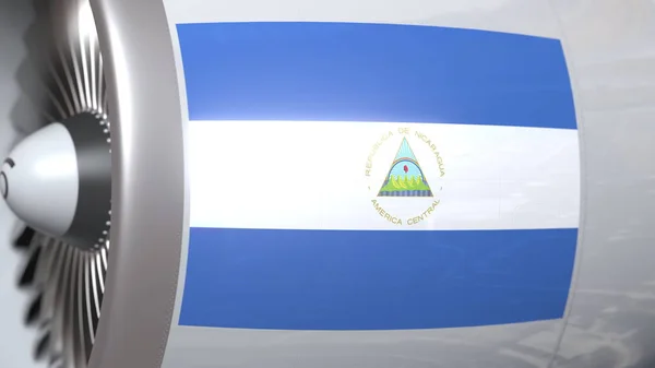 Flagge Nicaraguas auf Flugzeugtriebwerk schwenkend. Luftfahrtbezogenes 3D-Rendering — Stockfoto