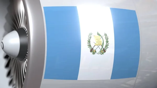 Ondeando la bandera de Guatemala en el motor tourbine del avión. Representación 3D relacionada con la aviación —  Fotos de Stock