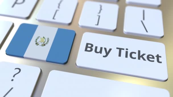 BUY TICKET text and flag of Guatemala on the buttons on the computer keyboard. Travel related conceptual 3D animation — Stock Video