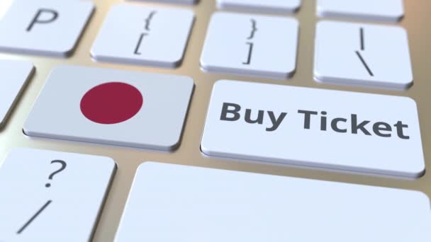 BUY TICKET teks dan bendera Jepang pada tombol pada keyboard komputer. Animasi 3D konseptual Travel terkait — Stok Video