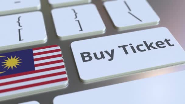 BUY TICKET text and flag of Malaysia on the buttons on the computer keyboard. Travel related conceptual 3D animation — Stock Video