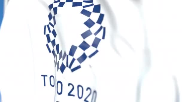 Прапор з іграми XXXII Олімпіади або 2020 літніх Олімпійських ігор в Токіо логотип, Крупний план. Редакційна анімація 3D-анімації — стокове відео