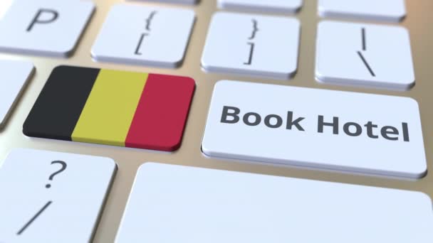 LIBRO HOTEL texto y la bandera de Bélgica en los botones del teclado del ordenador. Viajes relacionados con la animación conceptual 3D — Vídeos de Stock