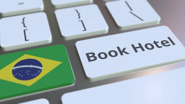BOOK HOTEL text and flag of Brazil on the buttons on the computer keyboard. Travel related conceptual 3D rendering — Stock Photo, Image