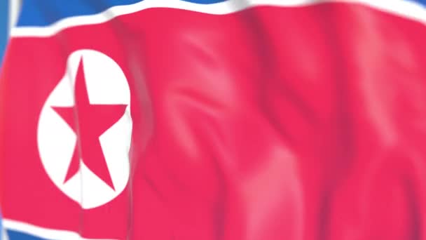 Размахивание национальным флагом КНДР крупным планом, зацикленная 3D анимация — стоковое видео