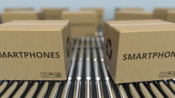 Boxes with smartphones on roller conveyors. Loopable 3D animation — Stock Video