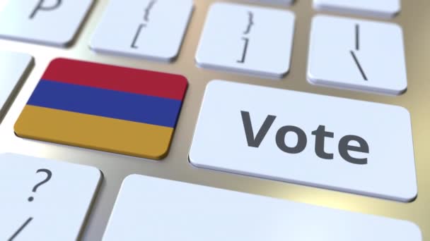 VOTE texto y bandera de Armenia en los botones del teclado del ordenador. Animación 3D conceptual relacionada con elecciones — Vídeo de stock