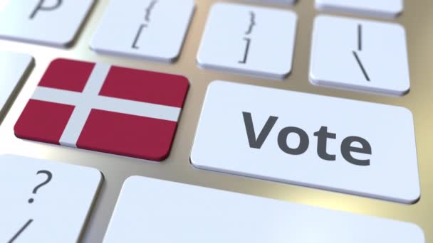 VOTE tekst og flag Danmark på knapperne på computerens tastatur. Valg relateret konceptuel 3D-animation – Stock-video