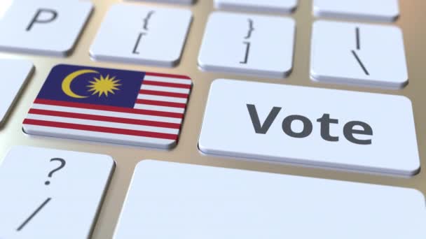 VOTE texto y bandera de Malasia en los botones del teclado del ordenador. Animación 3D conceptual relacionada con elecciones — Vídeos de Stock
