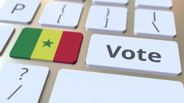 在计算机键盘上的按钮上投票塞内加尔的文字和旗帜。选举相关概念 3d 动画 — 图库视频影像