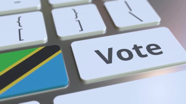 Hlasujte text a vlajku Tanzanie na tlačítkách počítačové klávesnice. Koncepční 3D animace voleb související s volbami — Stock video