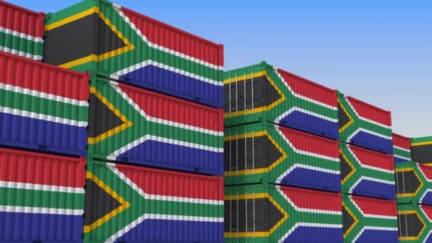 Container yard full of containers with flag of South Africa. Export or import related loopable 3D animation — Stock Video