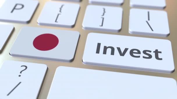Inwestuj tekst i flaga Japonii na przyciski na klawiaturze komputera. Koncepcyjna animacja 3D związana z działalnością biznesową — Wideo stockowe