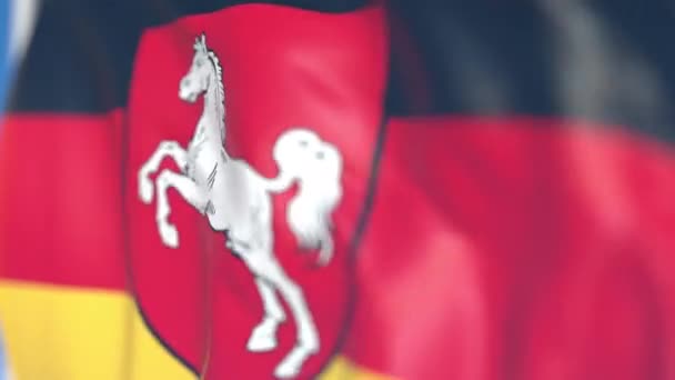 Pływające flaga dolnej Saksonii, stan Niemcy. Zbliżenie, pętla animacji 3D — Wideo stockowe