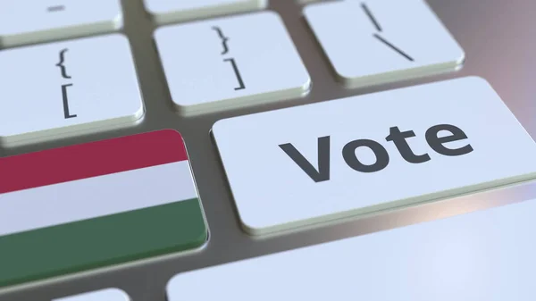 VOTA testo e bandiera di Ungheria sui pulsanti sulla tastiera del computer. Rendering concettuale 3D relativo alle elezioni — Foto Stock