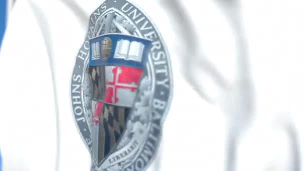 Waving flag with Johns Hopkins University emblem, close-up. Editorial loopable 3D animation — Stock Video