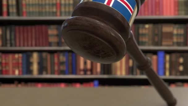 Flag of Iceland on falling judges gavel in court. National justice or jurisdiction related conceptual 3D animation — Stock Video