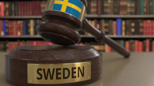 Flag of Sweden on judges gavel in court. National justice or jurisdiction related conceptual 3D rendering — Stock Photo, Image