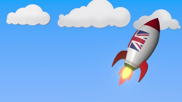 Gökyüzünde yüksek uçan roket üzerinde Birleşik Krallık bayrağı. İngiliz başarı veya uzay programı ile ilgili döngül hareket arka plan — Stok video