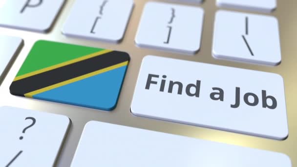 FIND En JOB tekst og flag Tanzania på knapperne på computerens tastatur. Beskæftigelse relaterede konceptuelle 3D animation – Stock-video