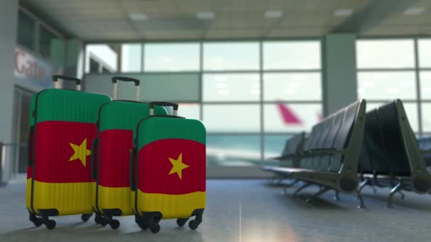 Travel suitcases with flag of Cameroon. Cameroonian tourism conceptual 3D animation — Stock Video