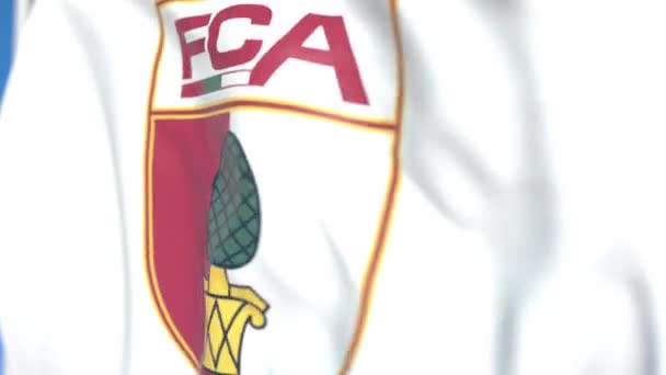 Flying flag with FC Augsburg football club logo, close-up. Animación en 3D loopable editorial — Vídeo de stock