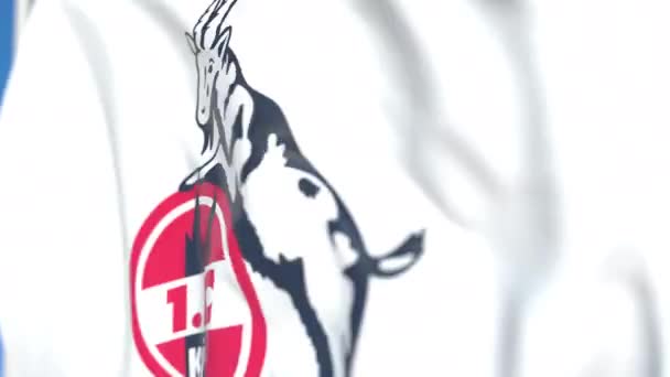 Acenando bandeira com logotipo do clube de futebol Koln, close-up. Editorial loopable animação 3D — Vídeo de Stock