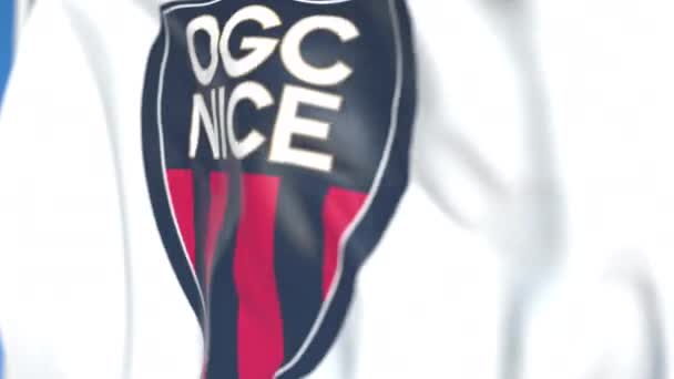 Viftande flagga med Nice Football Club logotyp, närbild. Redaktionell loopable 3D-animering — Stockvideo