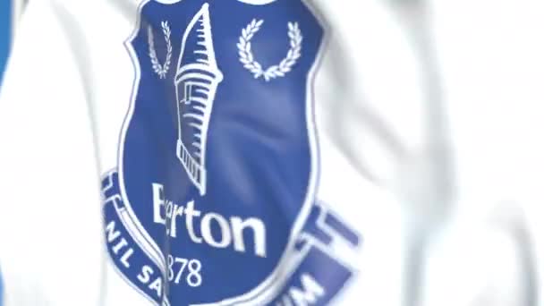 Flying flag z logo klubu piłkarskiego Everton FC, zbliżenie. Redakcyjnej pętli animacji 3D — Wideo stockowe