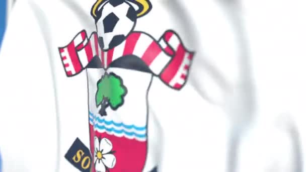 Waving flag with Southampton FC football club logo, close-up. Editorial loopable 3D animation — Stock Video