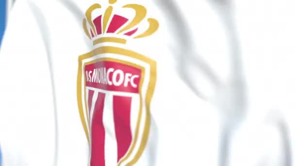 Vliegende vlag met Monaco Football team logo, close-up. Redactionele loop bare 3D-animatie — Stockvideo