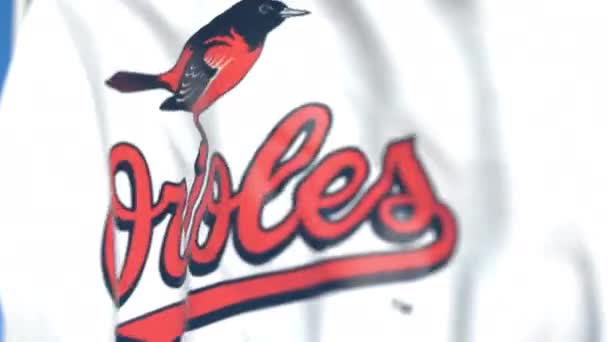 Bandeira voadora com logotipo da equipe Baltimore Orioles, close-up. Editorial loopable animação 3D — Vídeo de Stock