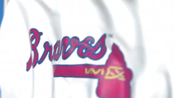 Viftande flagga med Atlanta Braves team logotyp, närbild. Redaktionell loopable 3D-animering — Stockvideo