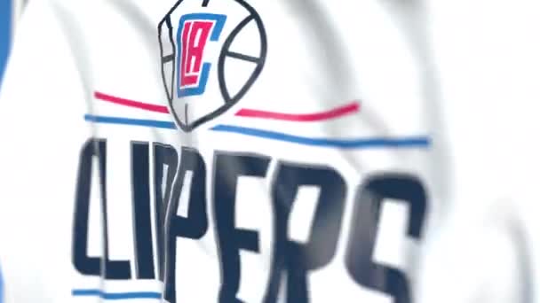 Bandeira acenando com o logotipo da equipe Los Angeles Clippers, close-up. Editorial loopable animação 3D — Vídeo de Stock