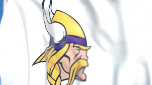 Bandera ondeando con el logotipo del equipo Minnesota Vikings, primer plano. Animación en 3D loopable editorial — Vídeo de stock