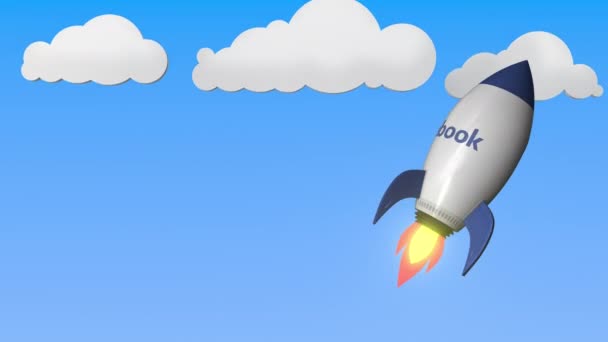 Facebook-logotypen på en raket mockup. Redaktionella framgång relaterade loopable 3D animation — Stockvideo
