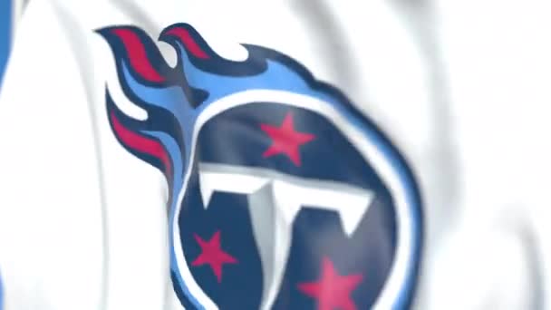 Flaga Flying z Tennessee Titans logo zespołu, zbliżenie. Redakcyjnej pętli animacji 3D — Wideo stockowe