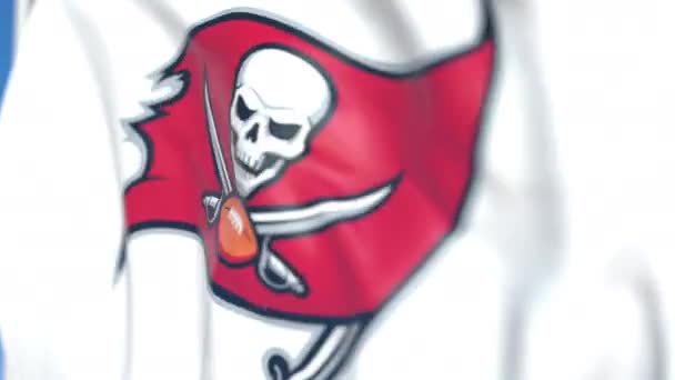 Flying flag with Tampa Bay Buccaneers team logo, close-up. Editorial loopable 3D animation — Stock Video