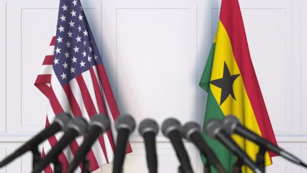 Vlajky USA a Ghany na mezinárodní schůzce nebo konferenci. 3D animace — Stock video