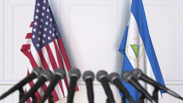 Vlajky USA a Nikaraguy na mezinárodní schůzce nebo konferenci. 3D animace — Stock video
