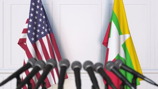 Flaggorna för USA och Myanmar vid internationella möten eller konferenser. 3D-animering — Stockvideo