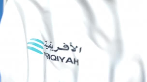Drapeau volant avec logo Afriqiyah Airways, gros plan. Animation 3D en boucle éditoriale — Video