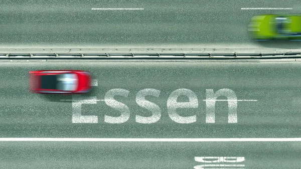Vzdušný pohled shora na silnici a auta odhalují titulek Essen. Cestování autem v Německu 3D vykreslování — Stock fotografie
