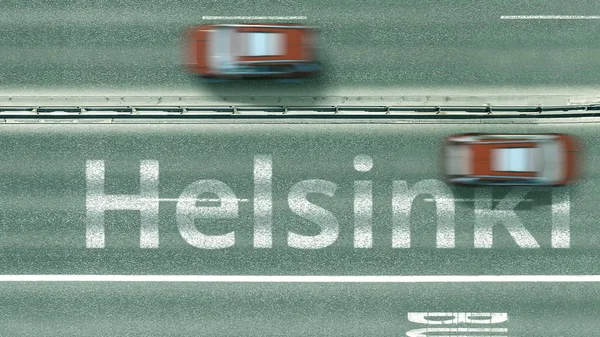 Pohled shora dolů po dálnici s odhalením helsinského textu. Řízení ve Finsku 3D vykreslování — Stock fotografie